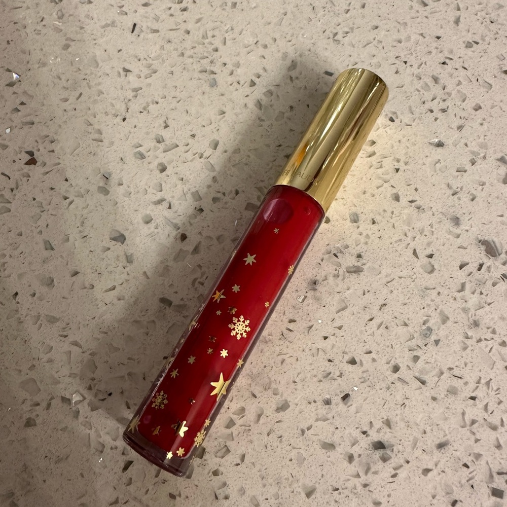 Pure color envy lip shine 107 tender trap